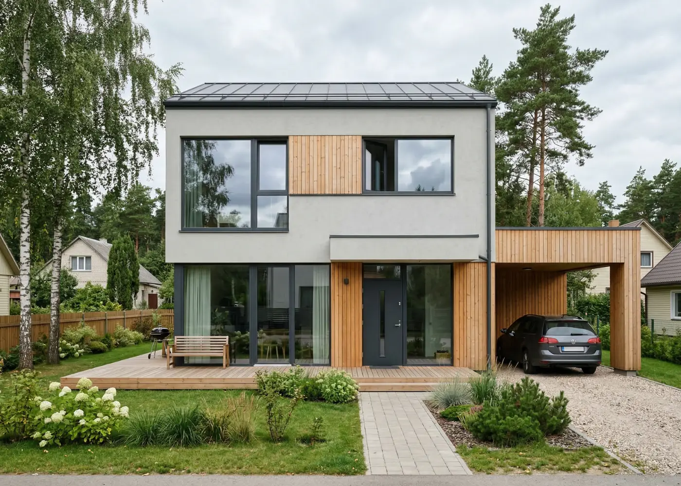 Modernus namas su dideliais langais ir vitrininėmis durimis